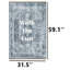 Tapis bleu délavé à motif de médaillons