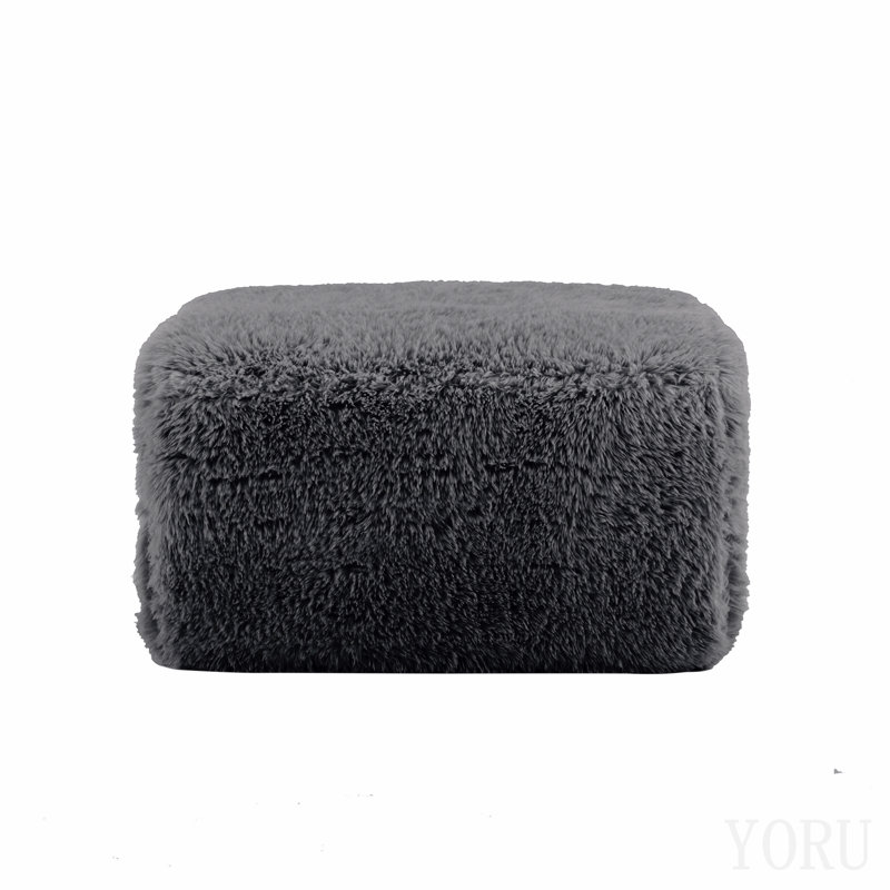 Repose-pieds en tissu moelleux gris foncé
