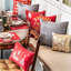 Coussin décoratif en coton glamour poms
