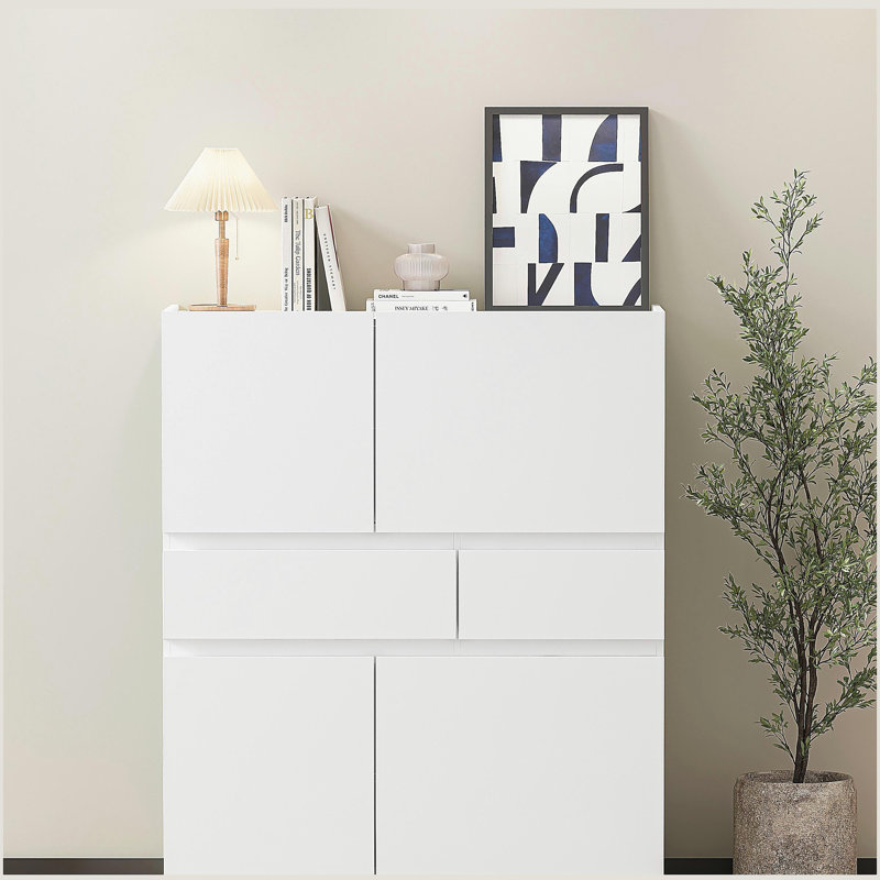 White wooden storage cabinet with 4 doors and 2 drawers