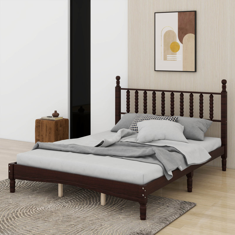 Grand lit plateforme en bois avec tête de lit en forme de gourde