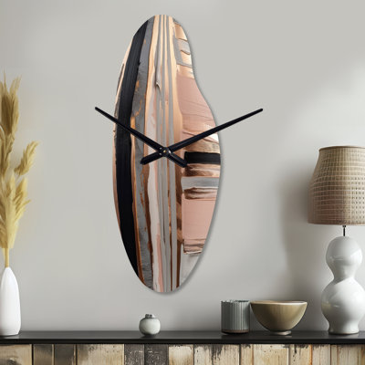 Or rose et formes roses en I contemporain - horloge murale asymétrique abstraite