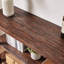 Console rustique de style ferme, entièrement en bois, avec 3 niveaux et plusieurs étagères, servant également de table d'appoint. Construction robuste en bois massif.