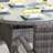 Ashley 4 - Person Wicker Patio Dining Set with Round Table, Cushions Included-133668831