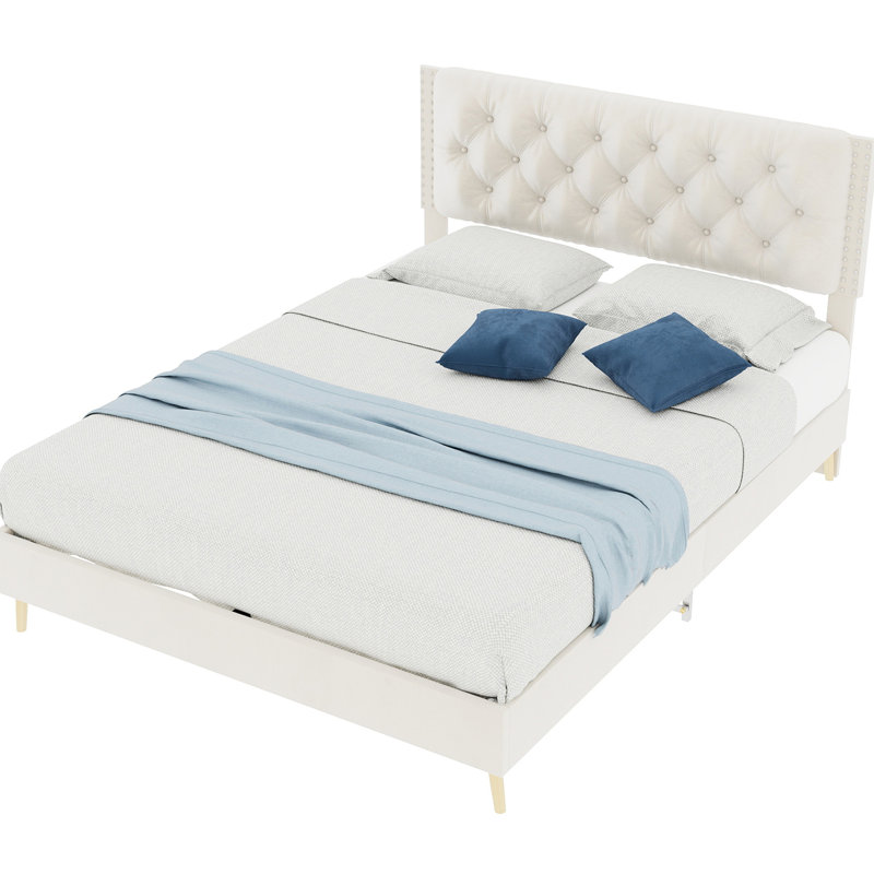 Lit double beige avec tête de lit, support stable, rembourrage, structure simple et élégante, bien conçu pour le sommeil, tête de lit ajoute du style, répond aux besoins spatiaux