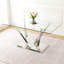 Ensemble de salle à manger avec base en acier inoxydable, une table rectangulaire avec quatre chaises sans accoudoirs pour la salle à manger et la cuisine
