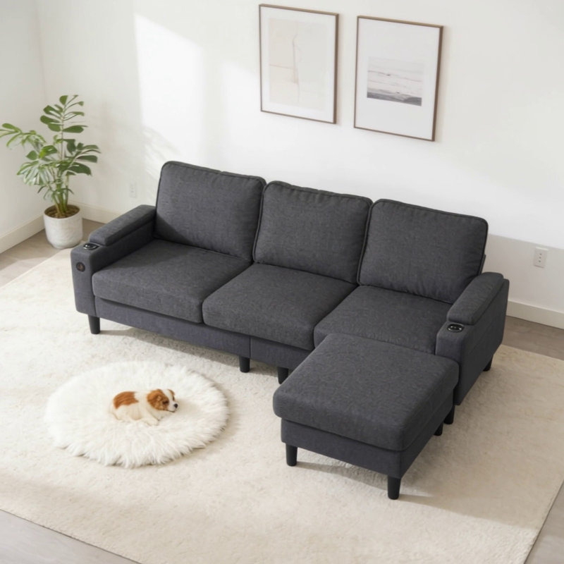 Canapé modulaire en L gris foncé avec repose-pieds de rangement et charge USB, parfait pour les espaces de vie compacts