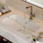 Meuble-lavabo mural flottant de 39,4 po avec lavabo en céramique, 2 tablettes ouvertes, pierre frittée blanche, conception moderne pour une utilisation de l'espace