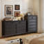 Armoire cinq tiroirs en bois massif noir avec pattes décoratives dorées