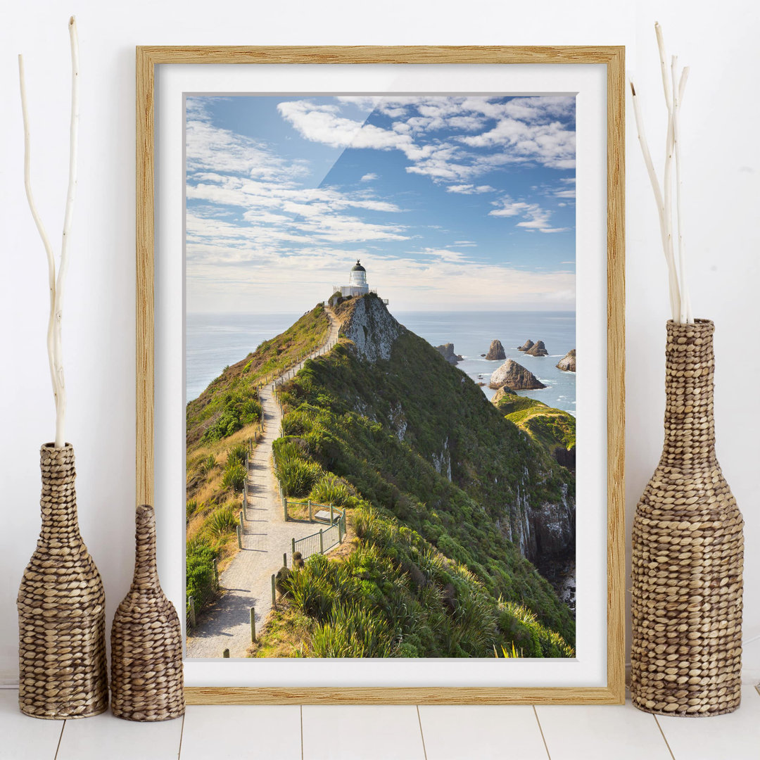 Gerahmtes Papierbild Nugget Point Leuchtturm und Meer Neuseeland