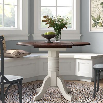Azizi 42 " Extendable Rubberwood Round and Oval Solid Wood Top with Solid Wood Base Dining Table
