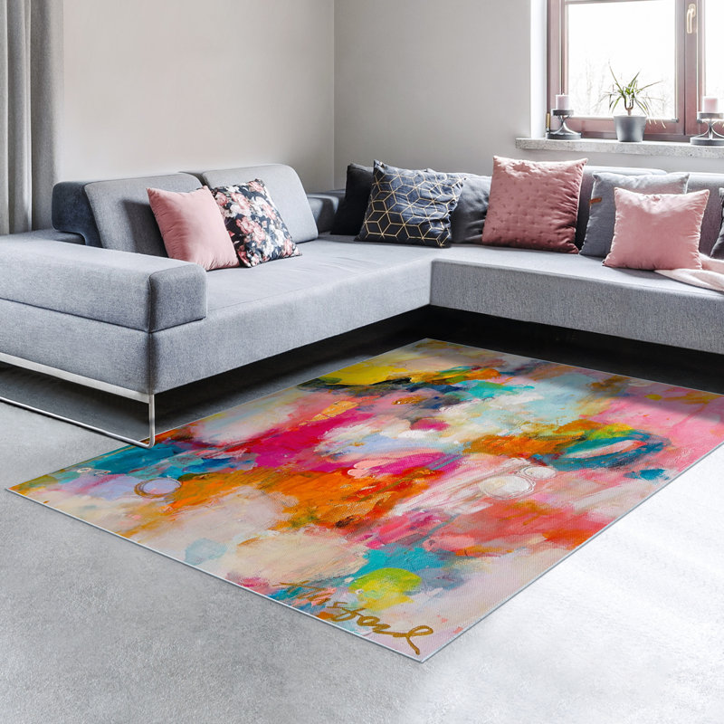 Un tapis abstrait lavable et coloré, tissé à la machine, doux avec envers antidérapant