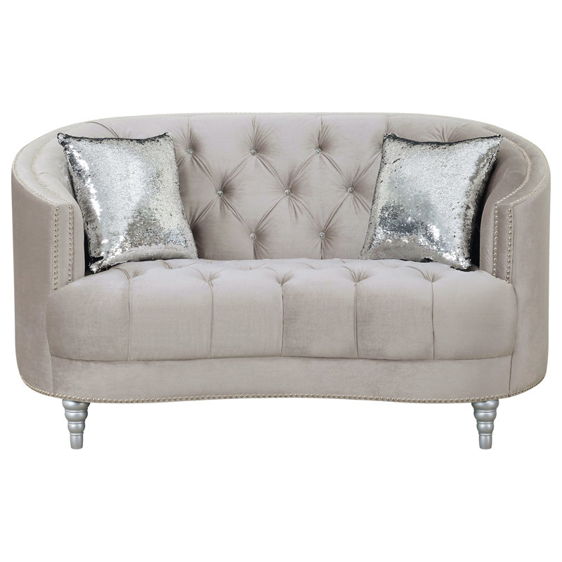 Causeuse grise grise contemporaine avec capitonnage