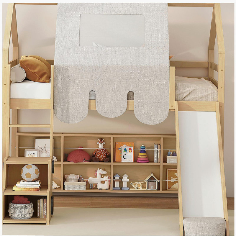 Wooden cabin frame with a tented loft bed