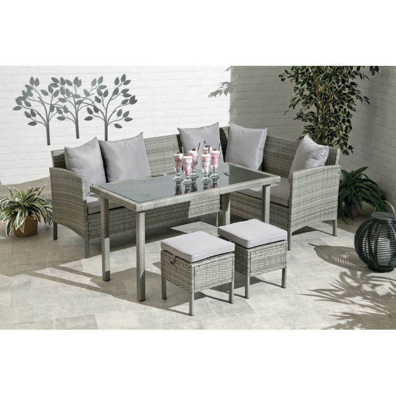 Weinstein 7 - Person Wicker Patio Dining Set with Rectangular Table , Cushions Included