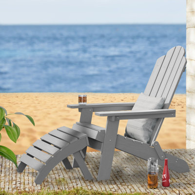 Chaise Adirondack pliante pour l'extérieur avec repose-pieds Facile à assembler et confortable Chaises Adirondack Chaise en plastique composite résistant aux intempéries pour l'extérieur