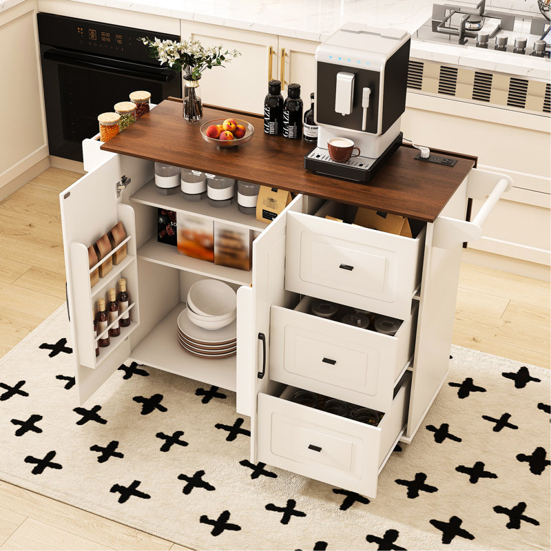 Chariot d'îlot de cuisine blanc avec rallonge escamotable et surface en bois, station de déjeuner mobile, trois tiroirs spacieux, armoires dissimulées, support à épices pour organisation, abattant de table pliable, barre sur
