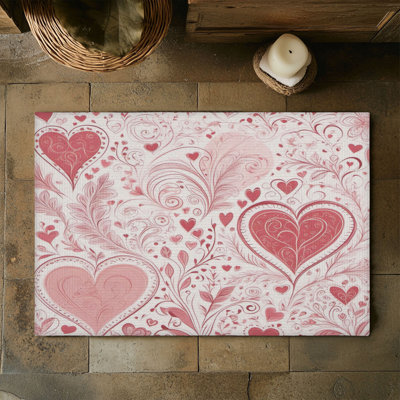 Tapis tressé rose Affection