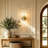 Lumina 2-Light Brass Wall Sconce with Textured Glass Shades and Up Down Lighting