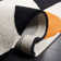 Rodeo Drive Wool Geometric Area Rug in Rust / Black