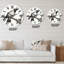 Horloge murale surdimensionnée sur une branche-60186664
