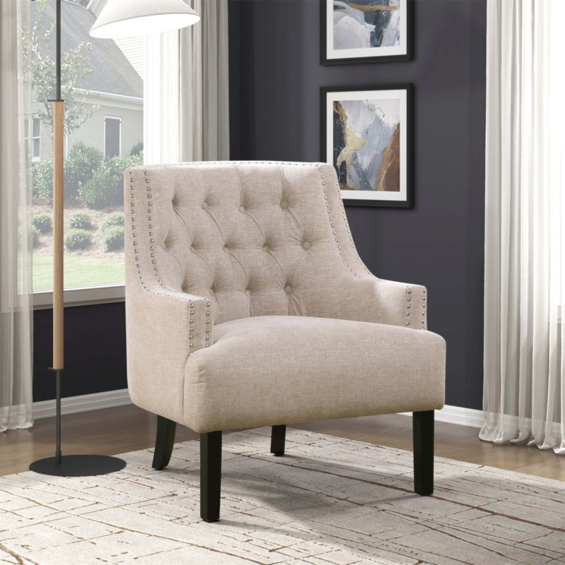 Chaise d'appoint moderne et moderne avec revêtement en chenille, conception capitonnée et structure en bois massif pour un décor de salon élégant.