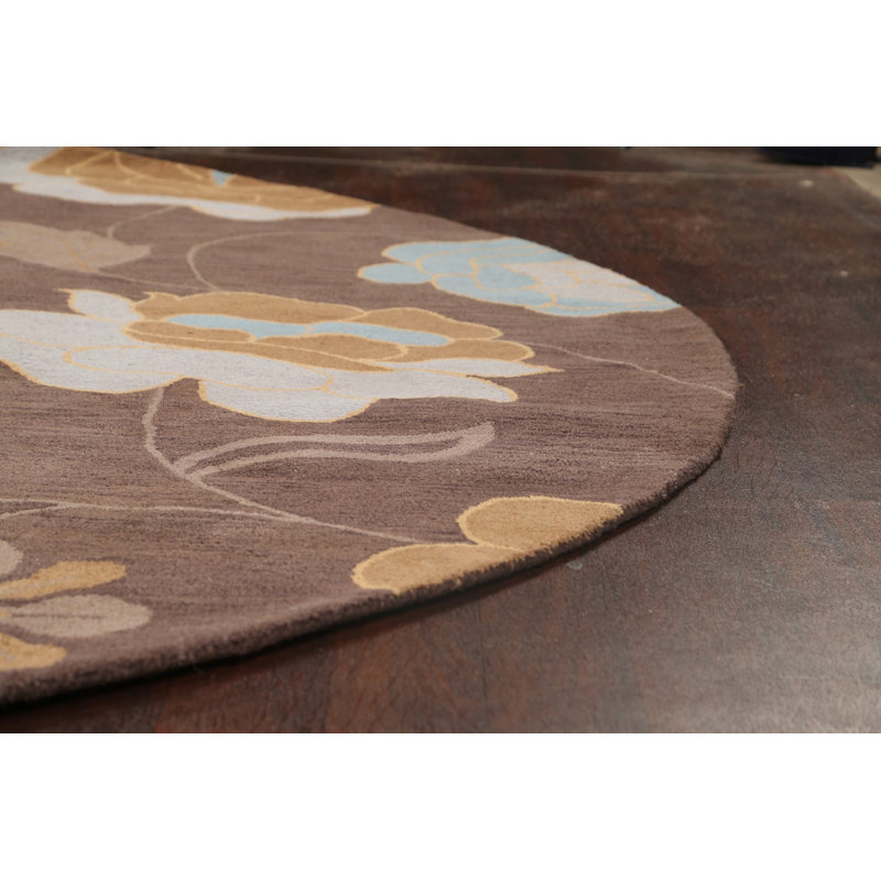Tapis rond brun en laine touffeté à la main