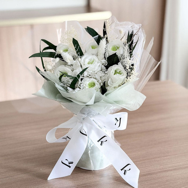 Bouquet préservé avec un feuillage luxuriant