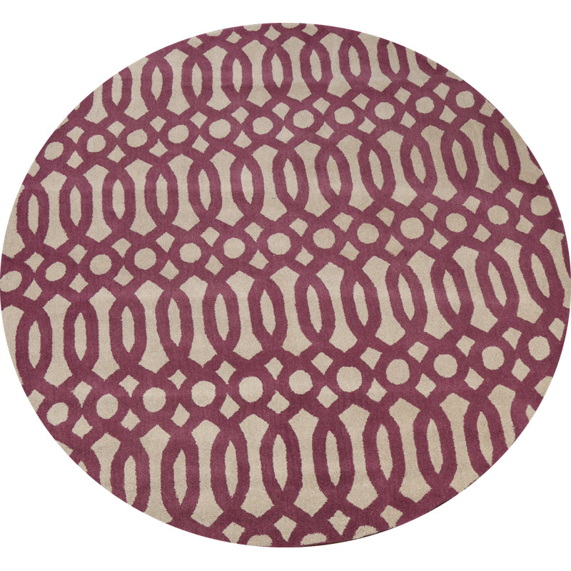 Tapis rond beige / rose en laine touffeté à la main