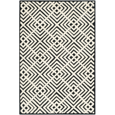 Nieve Geometric Handmade Cotton Black / White Area Rug