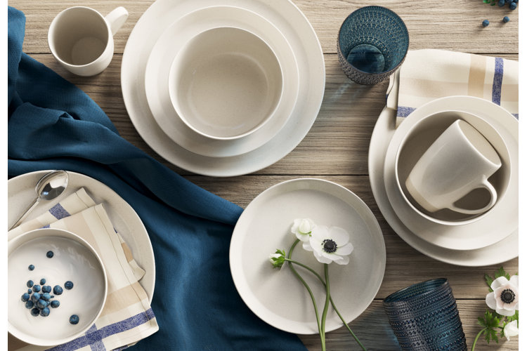 blue and white tablescape with classic white dinnerware