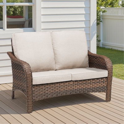 Causeuse de patio en osier 49,6 "avec coussins de siège beige