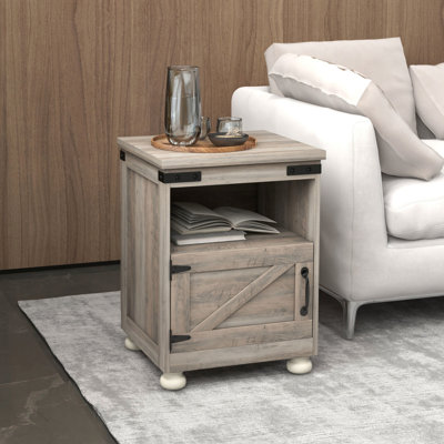 Table d'appoint grise avec rangement. Fin de style pour le salon. Tablette ouverte et grande armoire. Pieds modernes en bois. Stable et pratique. L 17,7 po x P 15,4 po x H 23,6 po. Table de rangement d'une capacité de 110 lb.