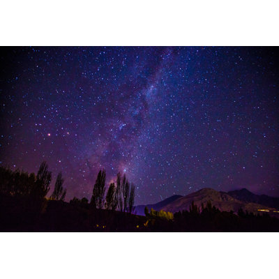 Milkyway With Pink Aurora Glow by Chemc - Wrapped Canvas Print