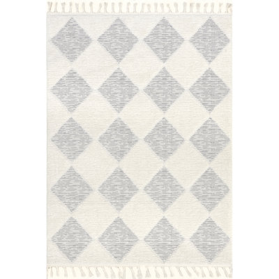 Marissa High/Low Diamond Tassel Area Rug