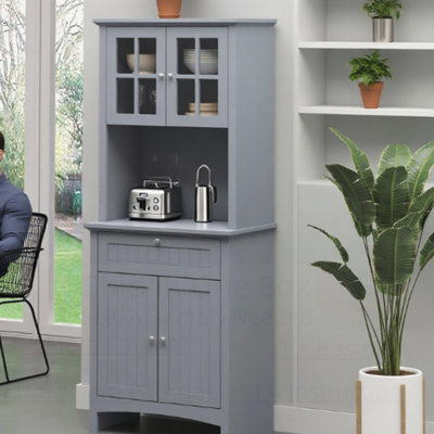Armoire de rangement à plusieurs niveaux avec tablettes réglables et tiroir central, parfaite pour les cuisines organisées et élégantes