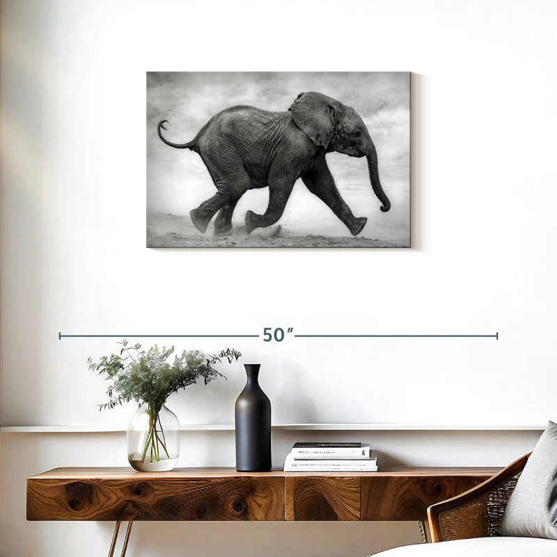 Bébé éléphant Brampt qui court, H 20 po x l 30 po