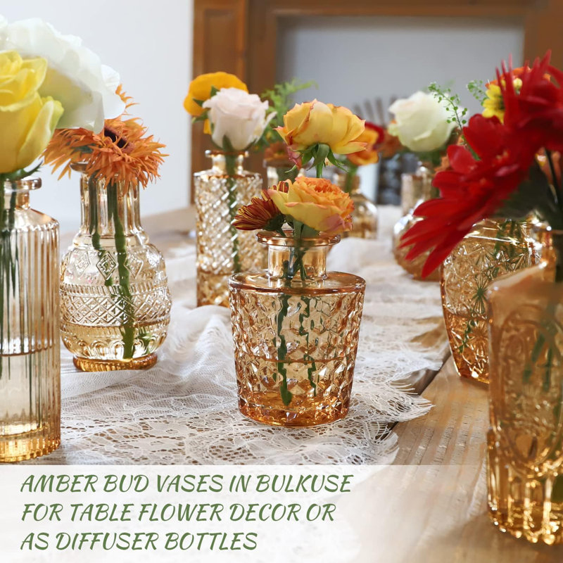 Ensemble de 22 mini vases en verre