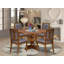 L'ensemble de table 7 pièces comprend une table ronde en bois et 6 chaises en similicuir gris foncé à haut dossier, finition noyer antique.-1290397618-1290397619-1290397622