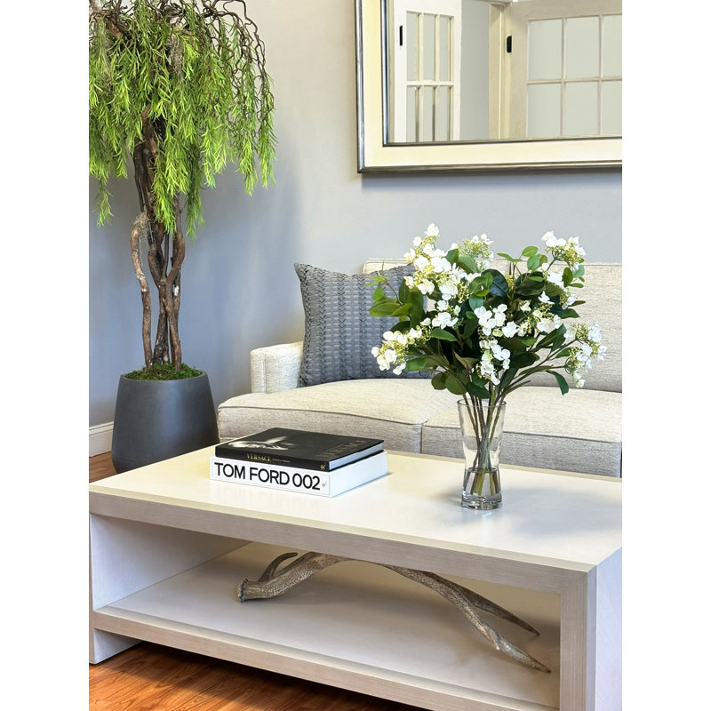 Viburnum Floral Arrangement In A Bubble Glass Vase With Fiscus Leaves