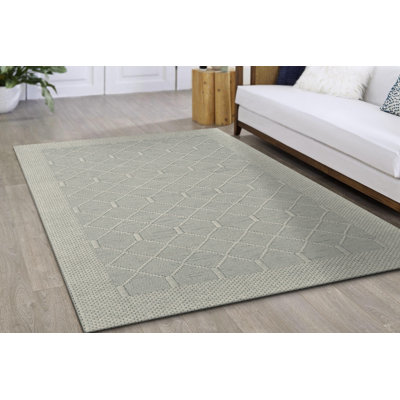 Tapis géométrique beige tissé à la main