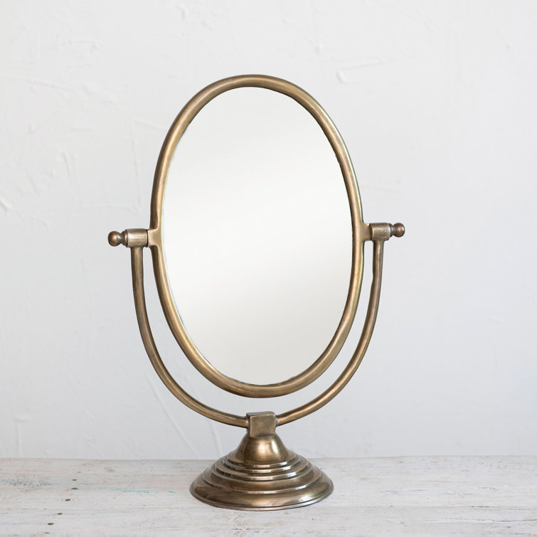 https://assets.wfcdn.com/im/70642905/resize-h755-w755%5Ecompr-r85/2435/243516502/Gabrijela+Antique+Aluminum+Swivel+Vanity+Mirror.jpg