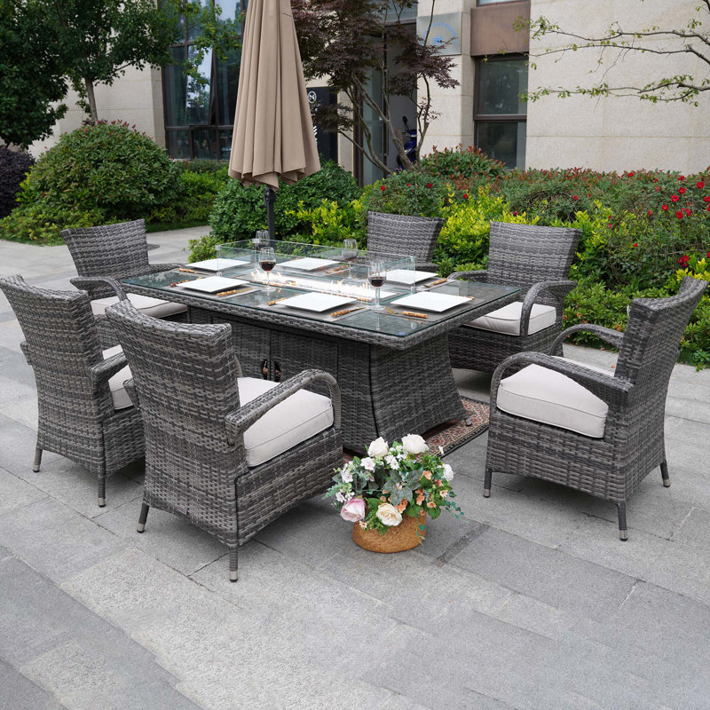 Ardala 6 - Person Wicker Patio Dining Set with Rectangular Table , Cushions Included, Grey