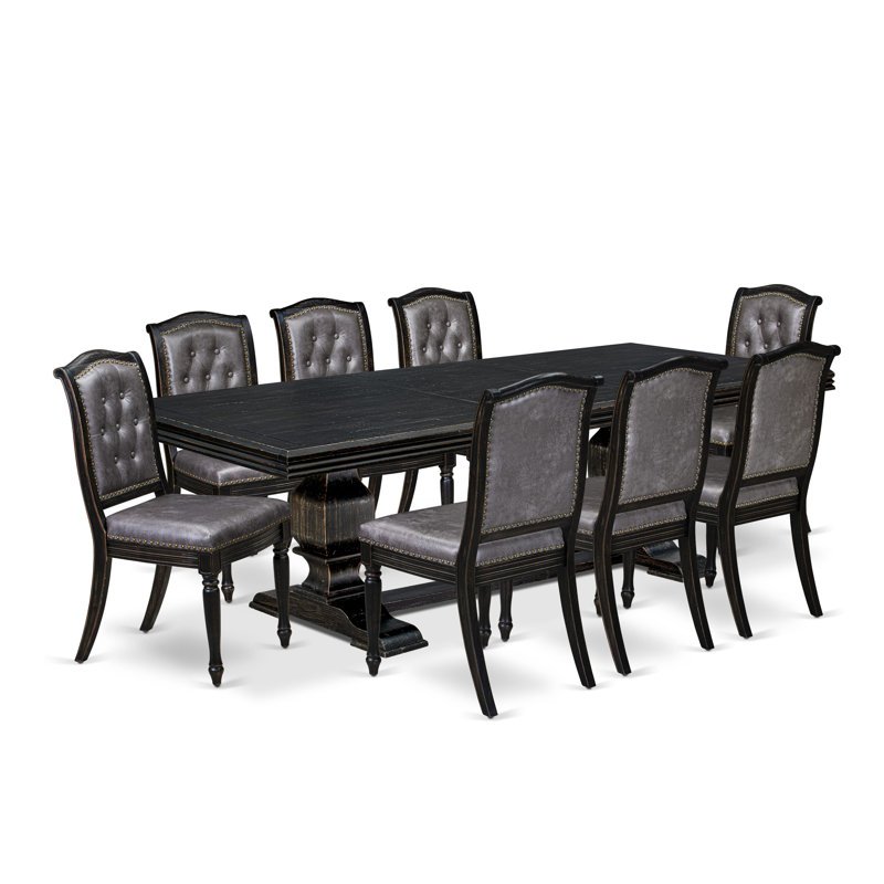 L'ensemble de table à manger 9 pièces se compose d'une table en bois et de 8 chaises Parsons en cuir de polyuréthane gris foncé avec dossier capitonné - Finition sable