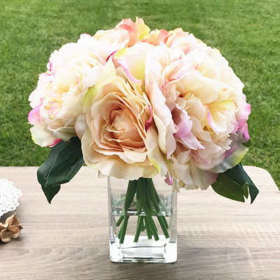 Arrangement floral en faux mélange dans un vase