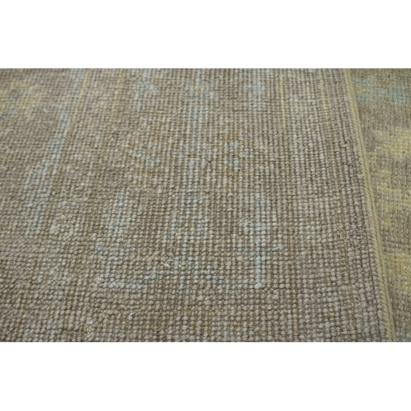Tapis oriental en laine noué à la main beige