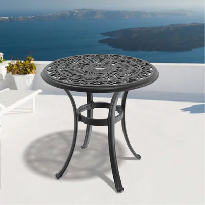 Table de salle à manger en fonte d'aluminium avec cadre noir et trou pour parasol