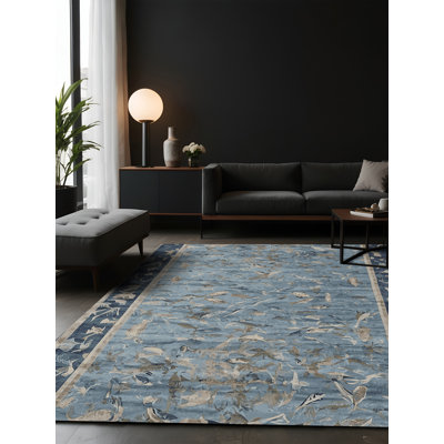Tapis gris soyeux et moelleux