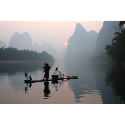 A Fisherman On The Water Fishing by BIHAIBO - Wrapped Canvas Print