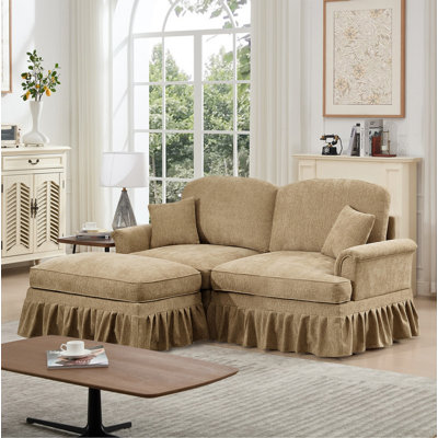Élégant canapé Mid-Century modulaire à deux places en forme de L avec accoudoirs évasés et volants amovibles, avec jupes plissées et pieds fuselés, canapé-lit en chenille confortable avec repose-pieds mobile, café clair